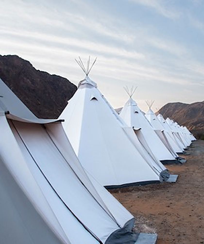 Teepees with two-layer winter covers